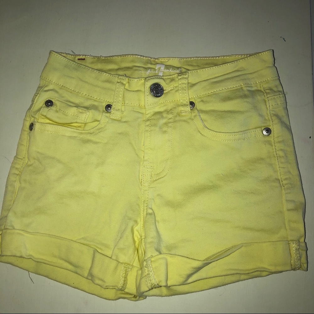 yellow shorts size 8 pockets in front and back